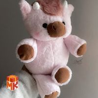 عروسک گاو صورتی