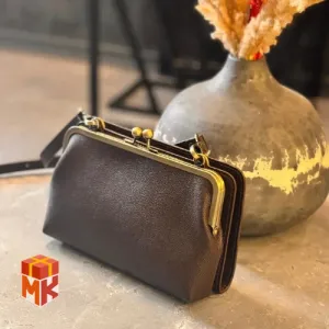 کیف زنانه چرم طبیعی با دهانه فلزی